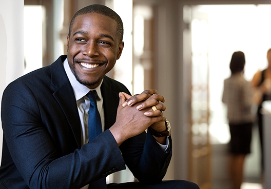 man in suit smiling