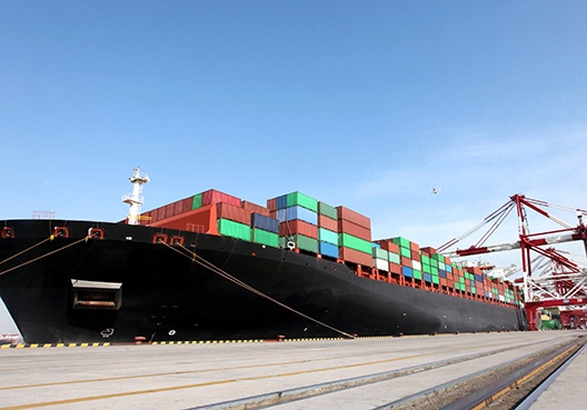 marine cargo ship docked at the bay