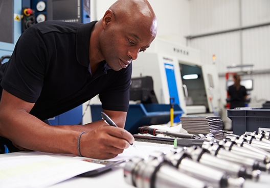 man working with industrial equipment